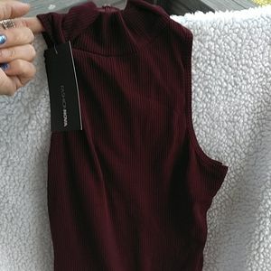 Fitted dress with a body suit built in